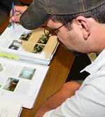 Student Looking at Textbook